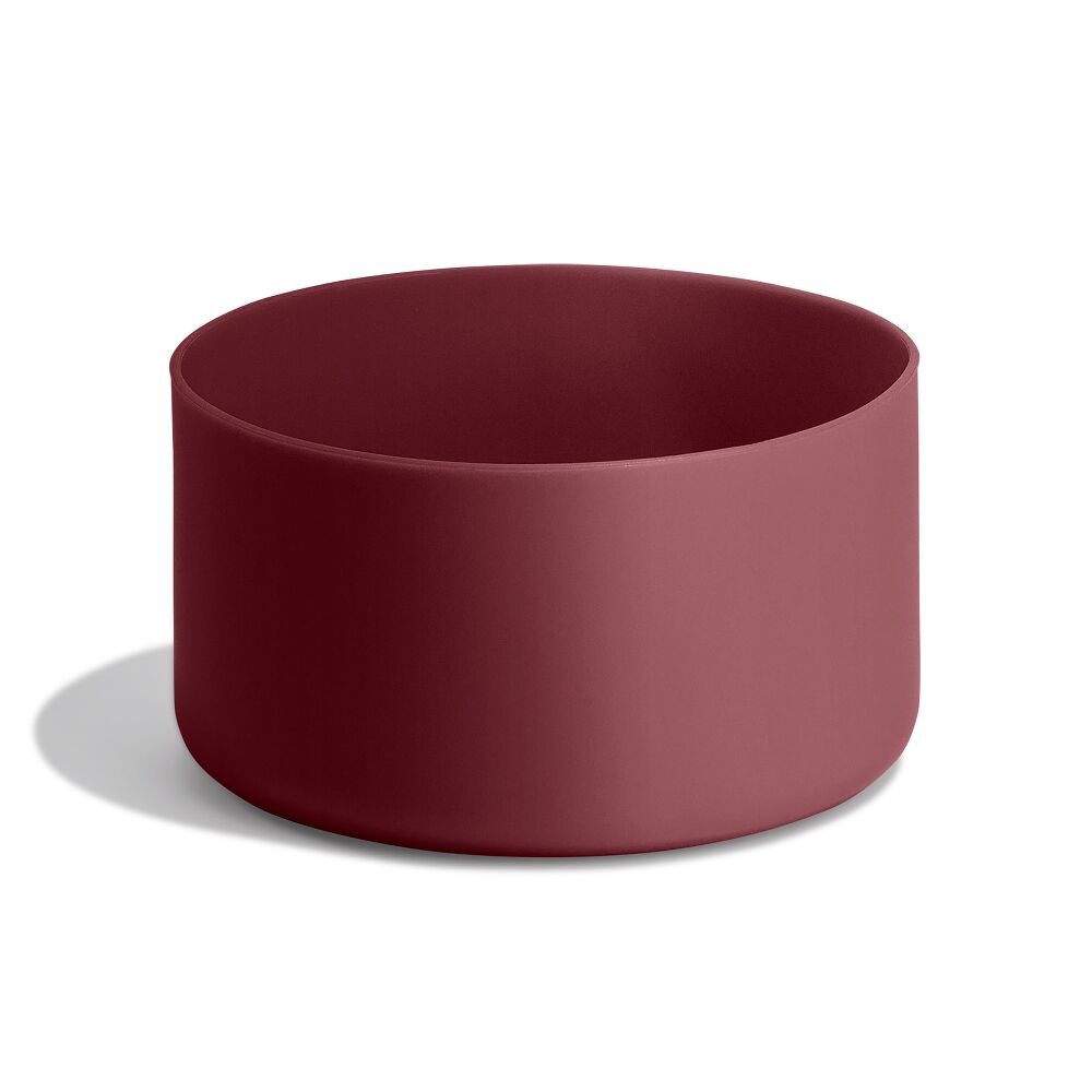 Maroon cylindrical Hydro Flask container with smooth matte sides, open top, and uniform interior color. Minimalist design on white background.